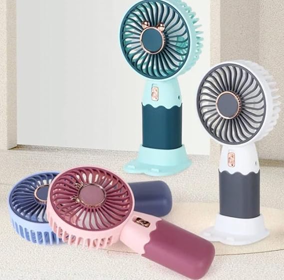 61yVGHElX7L._SX569_ Premium Mini Rechargeable Handheld Fan with USB Charging Dock